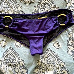 Victoria’s Secret purple and gold metallic bikini bottom. Size medium.